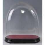 A Victorian glass dome on ebonised plinth, h.56cmCondition report: Glass dimensions: height 50cm,