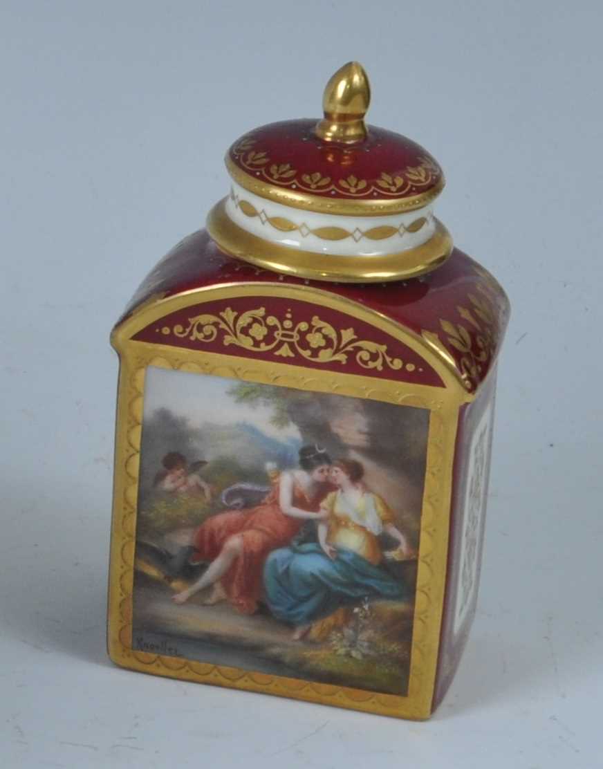 A late 19th century Vienna porcelain tea canister and cover, the obverse painted with a classical