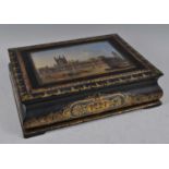 A Victorian papier-mâché table box, the hinged cover centrally decorated with the Houses of
