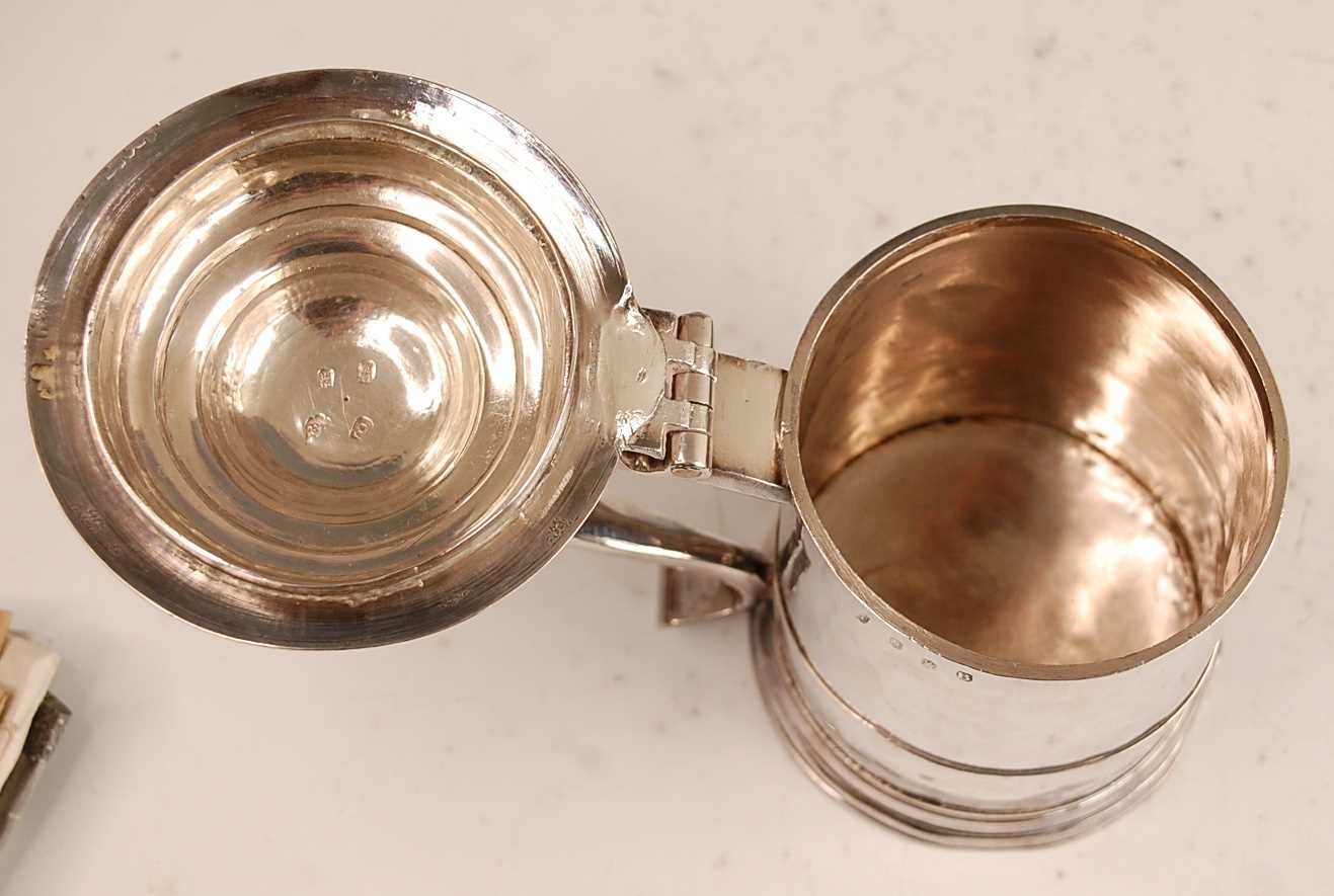 A George I silver lidded tankard, of plain tapering cylindrical form with banded girdle, having - Image 7 of 19