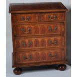 A walnut and yew wood oyster veneered chest, in the William & Mary style, having a crossbanded top