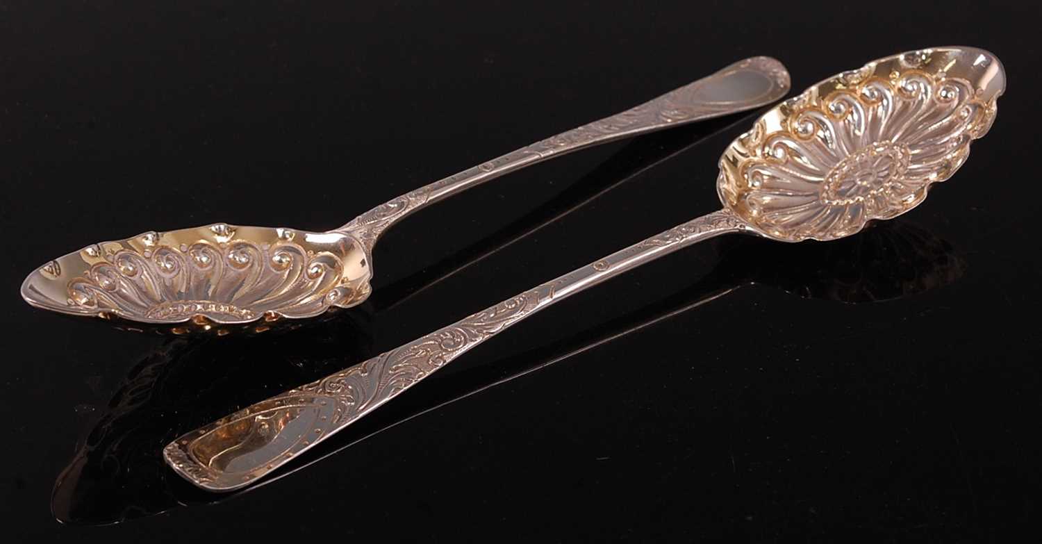 A matched set of four George III silver berry spoons, in the Hanoverian pattern, the gilt-washed - Image 2 of 8