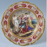 A late 19th century Vienna porcelain cabinet plate, polychrome decorated with figure scene after