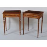 A pair of walnut and figured walnut lamp tables, each having a cross and feather banded top over