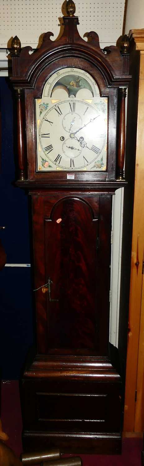 An early 19th century mahogany and flame mahogany longcase clock, having arched painted moonphase