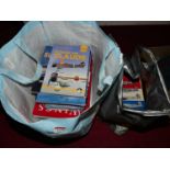 Two bags containing a quantity of various hard and soft backed books, all aircraft interest to