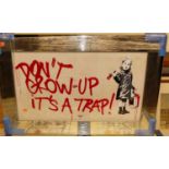 After Banksy - Don't Grow Up It's a Trap!, reproduction print in mirrored frame, 56 x 85cm