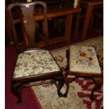 A pair of 18th century mahogany splatback dining chairs, having floral embroidered drop-in pad