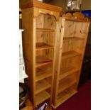 A pair of modern pine freestanding open bookshelves, with adjustable shelved interior, w.77cm;