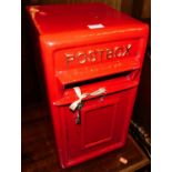 A contemporary painted cast iron and metal backed small postbox, with single door (two keys), 24 x