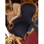 A mid-Victorian mahogany spoonback buttoned upholstered armchair, width 66cm, together with one