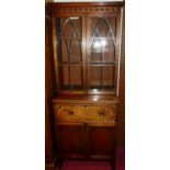 A Regency mahogany narrow secretaire bookcase, having twin lancet glazed upper doors, with two