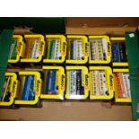 One tray containing 12 boxed Corgi buses in various liveries, in near mint-mint condition.