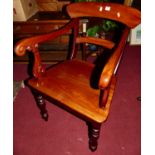 A pair of Victorian style mahogany barback panelled seat scroll elbow chairs, each on turned