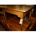 A modern pine round cornered small farmhouse kitchen table, raised on turned supports, length 107.