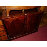 A 19th century mahogany double door side cupboard, having oval panelled cupboard doors, width 118cm