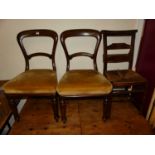 A set of three Victorian mahogany balloon back dining chairs, together with a single ladderback