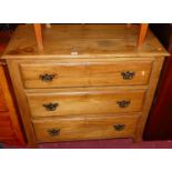 An Edwardian satin walnut chest of three long drawers, width 90cm