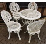 A Victorian style white painted, floral pierced galvanised metal patio set, comprising; circular