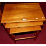 A 1970s teak next of three occasional tables, the largest w.50cm