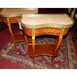 A pair of French transitional style beech and walnut single drawer two tier side tables, each with