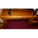 A contemporary light oak single drawer side table, w.120cm