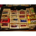 A large quantity of Lledo buses all boxed in one tray (50+ items).