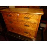 A Victorian satinwood low chest of two short over two long drawers, width 101cm