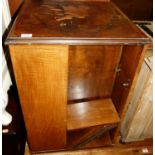 A 1930s walnut revolving bookcase, w.47cm Condition report: With losses and patched re-veneered