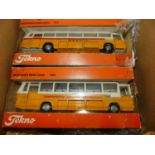 2x boxed Tekno coaches (poor boxes). one in "PTT" livery and the other in "Transportes Aereos