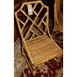 A set of six bamboo and wicker dining chairs