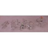 A collection of nine Swarovski Crystal animal figures, to include an elephant, shark, snake, pig,