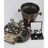 A box of miscellaneous metalware, to include plated wine cooler, boxed set of six white metal coffee