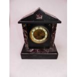 A Victorian black slate and rouge marble eight-day mantel clock, the enamelled chapter ring