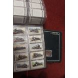 A collection of miscellaneous items to include early 20th century stereoscopic viewing cards by