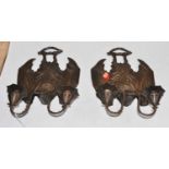 A pair of bronzed metal twin branch wall lights, fashioned as bats, each h.34cm