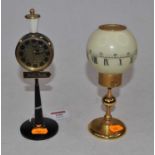 A 20th century alarm clock in the form of a street lamp for the Moulin Rouge, having a circular dial