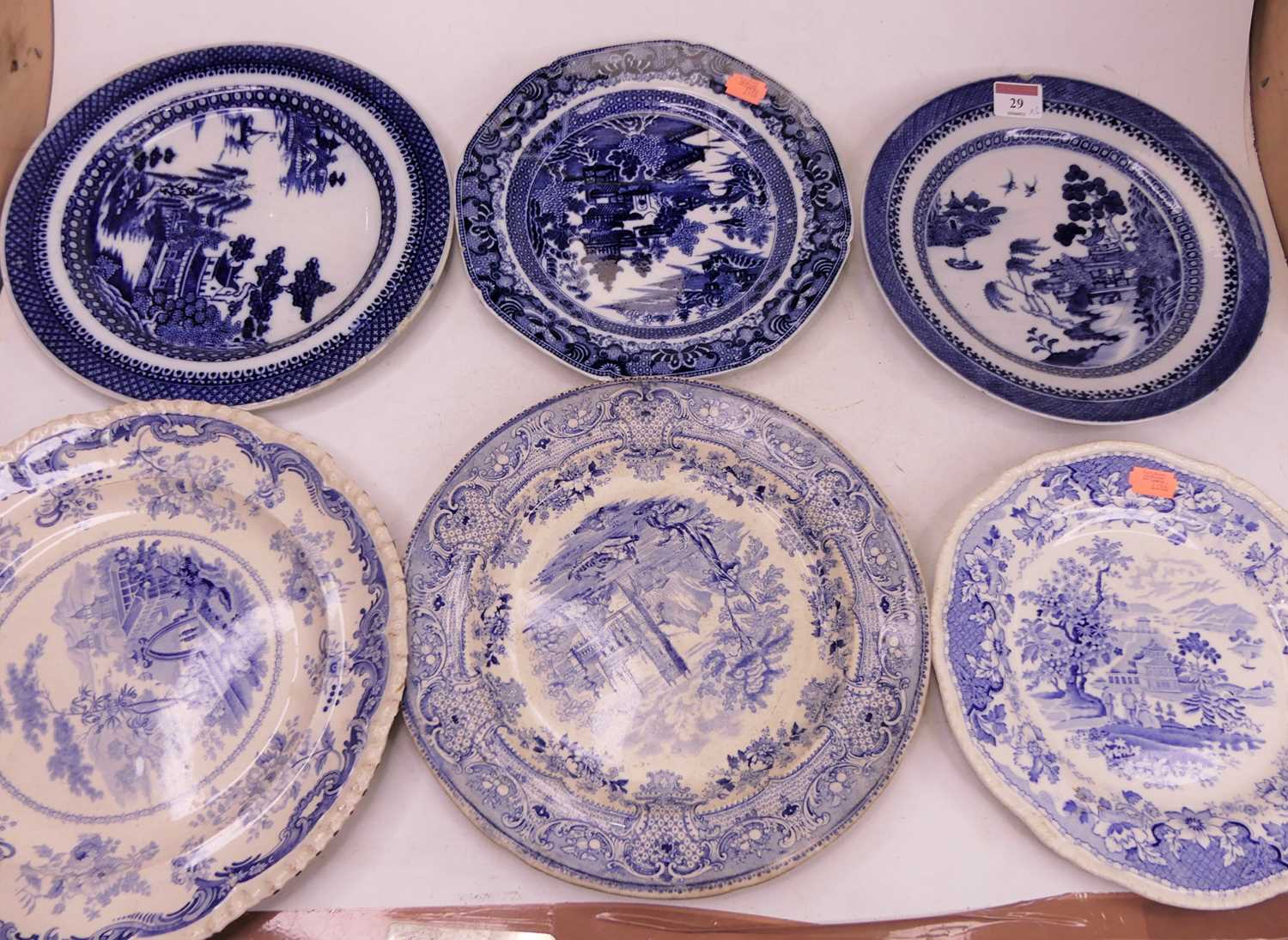 A 19th century Chinese export blue and white transfer decorated porcelain plate, in the Willow