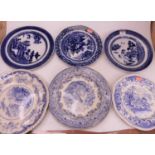 A 19th century Chinese export blue and white transfer decorated porcelain plate, in the Willow