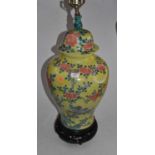 A Chinese yellow glazed jar and cover, of baluster form, converted into a table lamp, the lid with