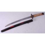 * A Japanese Shinto Settsu Wakizashi, the 38cm slightly curved blade signed to the tang Kawachi (no)