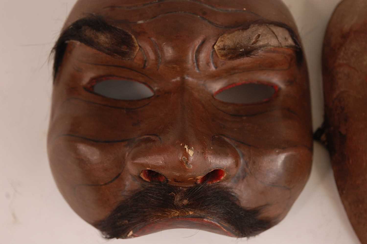 * A dance mask polychrome painted and with natural hair to the upper lip and eyebrows, 16 x 15cm, - Image 2 of 5