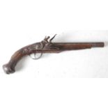 * An early 19th century Turkish flintlock pistol, having a 22cm barrel with engraved decoration with