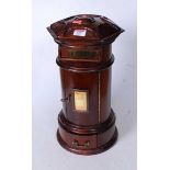 A Victorian style mahogany novelty post-box, having an hexagonal top above a brass letterbox, the