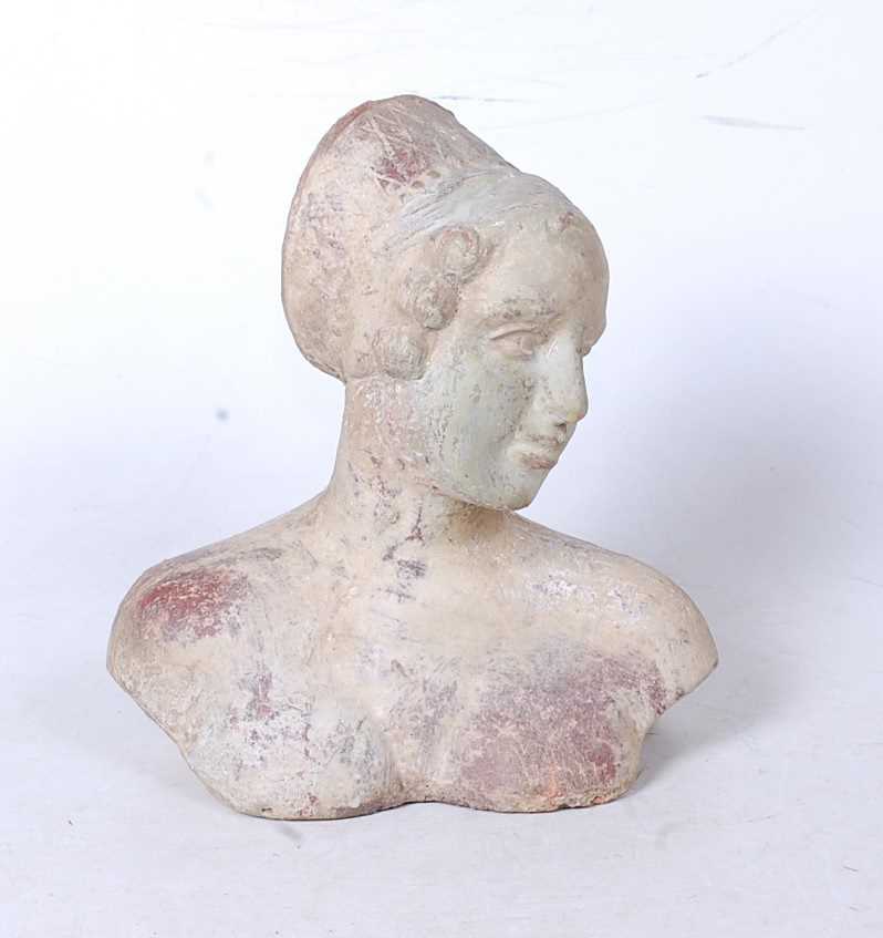 A moulded terracotta head & shoulders portrait bust of a lady, height 22cm