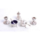 A collection of miscellaneous items, to include a pair of modern silver dwarf table candlesticks