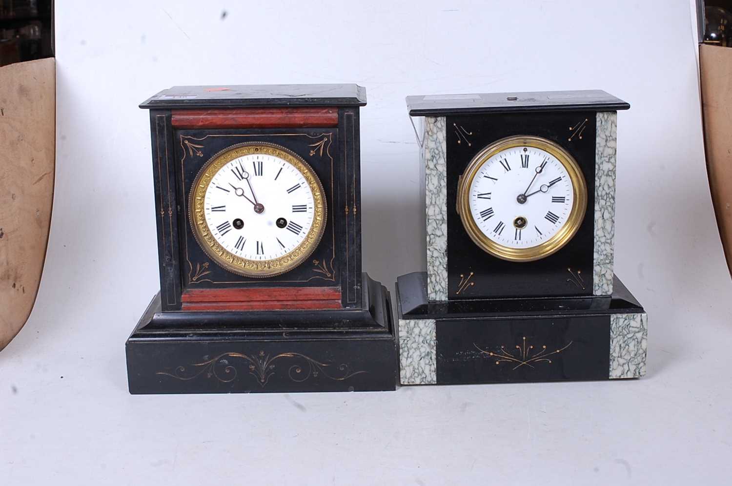 A late Victorian black slate and grey marble mantel clock having an enamel dial with Roman - Image 2 of 3