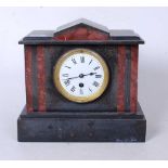 A late Victorian black slate and rouge marble mantel clock, of architectural form, having an