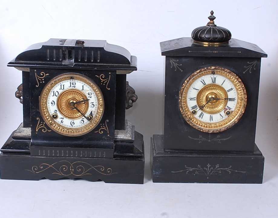 A late Victorian black slate mantel clock of architectural form having an enamelled chapter ring - Image 2 of 3