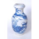 A Chinese export blue and white vase, having an onion top to a baluster body, underglaze blue